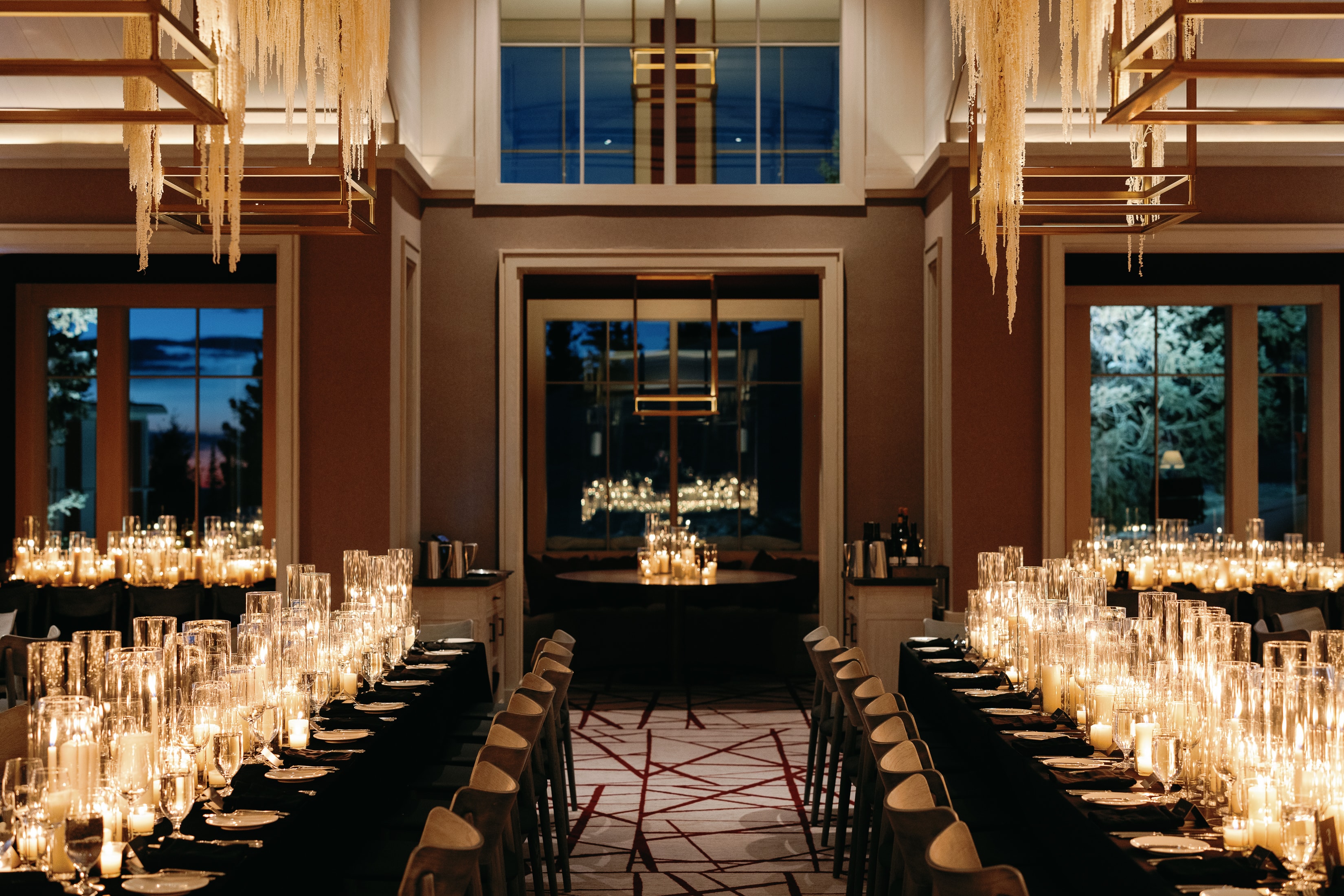 Corporate leadership forum with stage and audience in an elegant ballroom